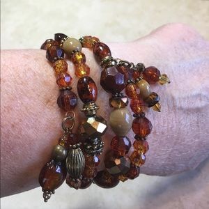 Brown and amber-look beaded memory wire 3 row bracelet
